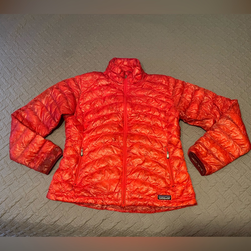 Women’s  lightweight Large Patagonia down red jacket.